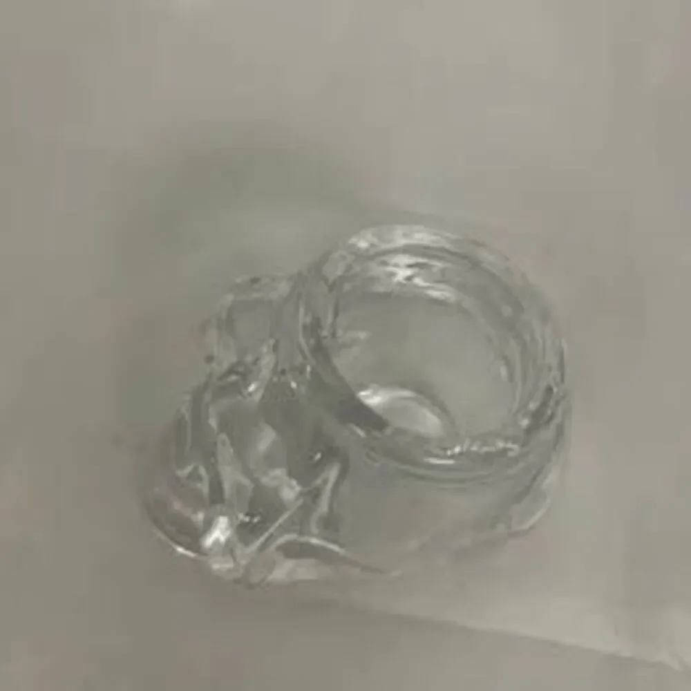 Glass skull candle holder